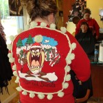 hairdresser wearing an ugly christmas sweater sweatshirt