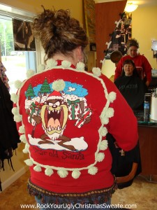 hairdresser wearing an ugly christmas sweater sweatshirt 