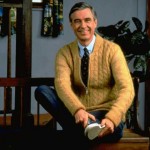 Picture of Mr Rogers in a yellow sweater