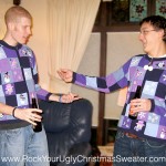 Picture of two guys in purple ugly Christmas sweaters