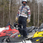 Snowmobiling in ugly Christmas sweater