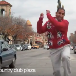 dancing in an ugly Christmas sweater