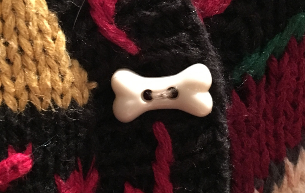 Bone clasp on Spot ugly Christmas sweater