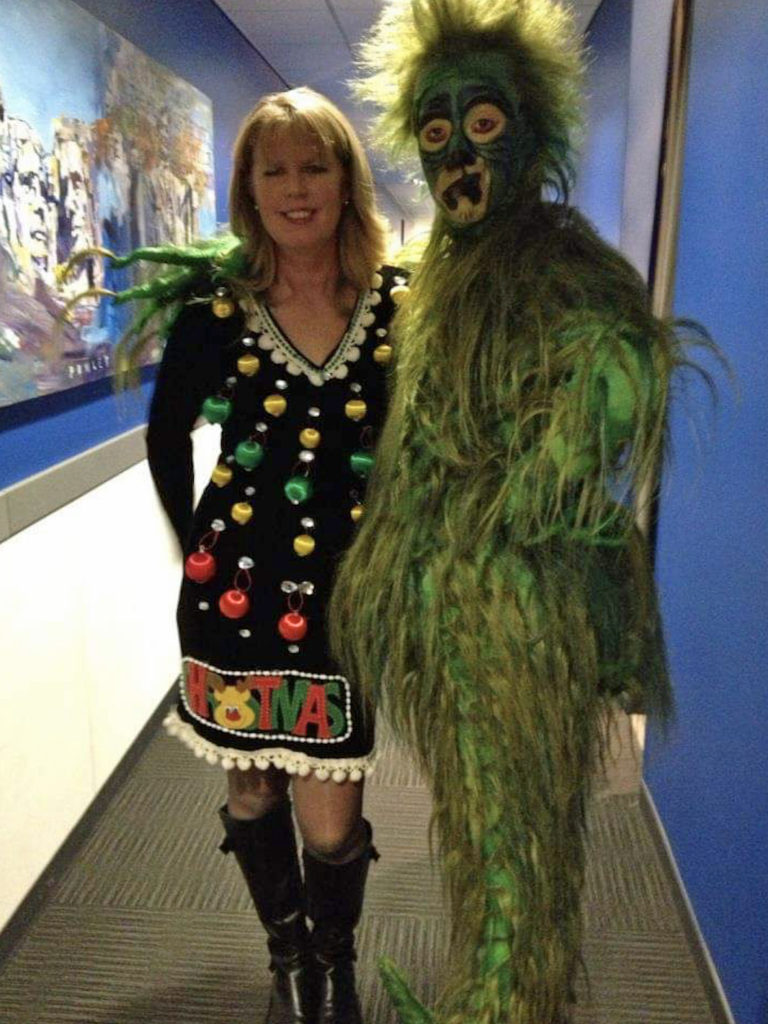 Grinch costume and ugly Christmas sweater dress with ornaments